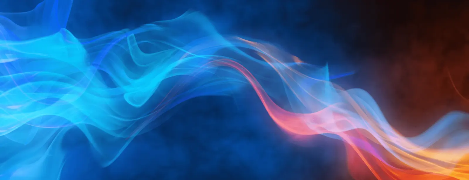 Abstract image featuring a flowing mixture of blue and red light waves, creating a dynamic, smoky effect. The colors blend and overlap in the center, set against a dark background, evoking a sense of energy and movement reminiscent of the expertise you'd expect from East-West Electric professionals.
