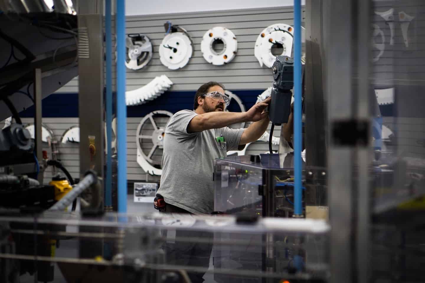 Electrician performing industrial electrical work